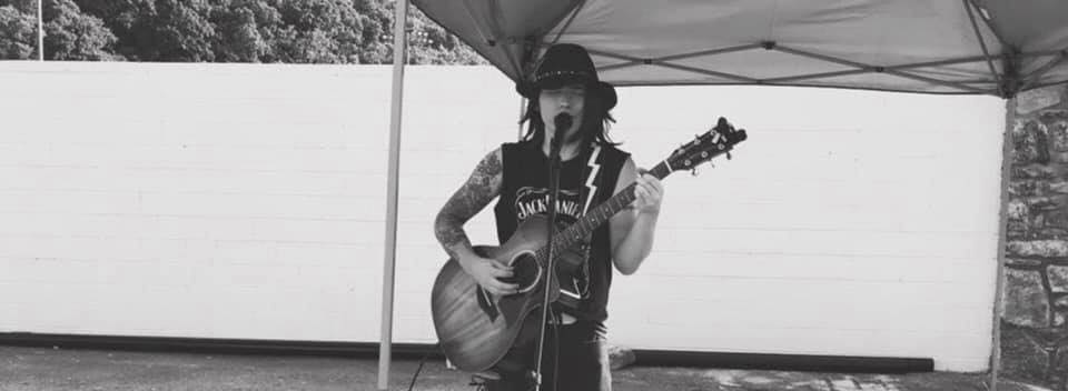 Chad Cox playing guitar
